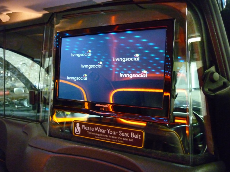 Credits   Living Social Taxi Photos   LCD screen with disco lighting reflections