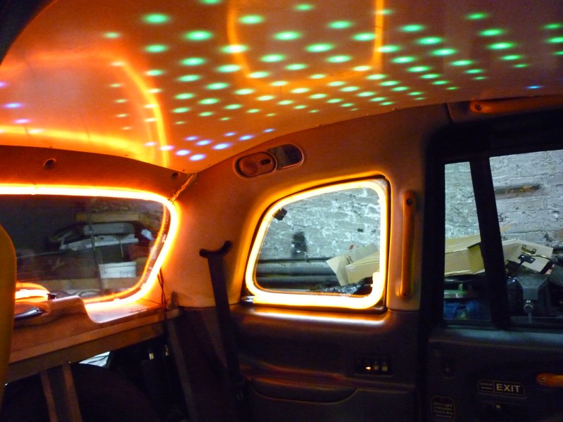 Credits   Living Social Taxi Photos   Disco lights in a taxi cab ... Yeah Baby!